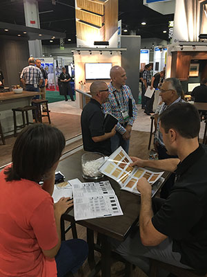 Shawn Potts, Midwest Regional Sales Manager, reveals our new Wood catalog! Shawn Sievers, Northern CA Sales Manager (foreground) explains the benefits and features of our Elk Grove, CA drawer box offering.