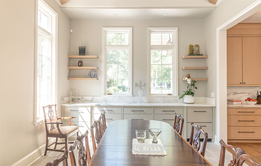 The popular Vienna style with beaded outside detail elevates this space featuring Rift White Oak veneer doors