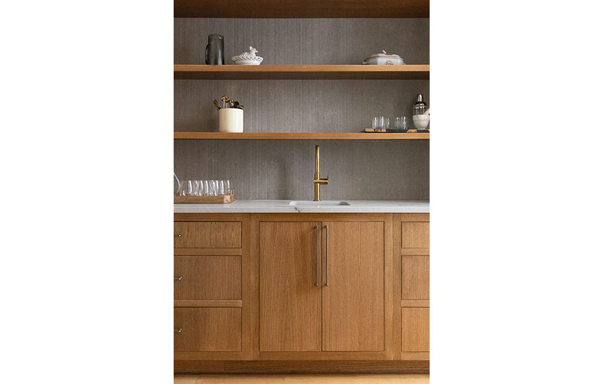 Rift White Oak Veneer Cabinet Doors elevate this beautifully designed space