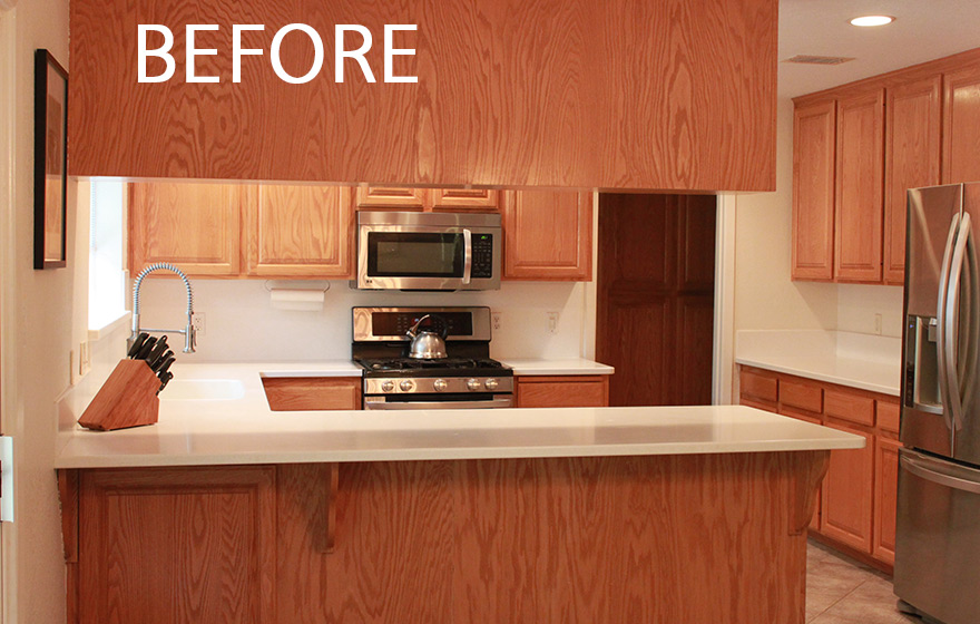 A fresh look and opened up layout shine in this refaced kitchen. 