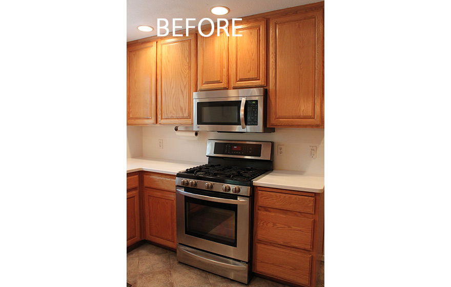 A fresh look and opened up layout shine in this refaced kitchen. 