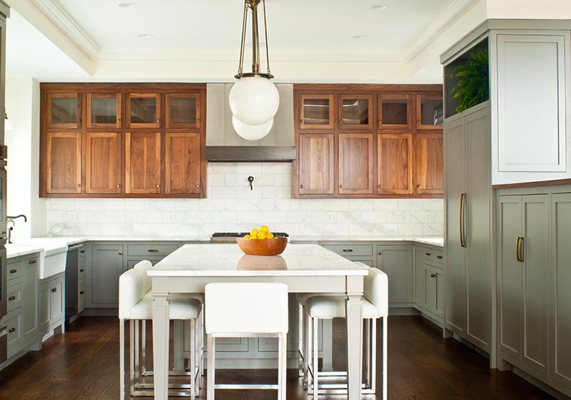 Combining the stunning natural character of Walnut with on-trend grey paint is a perfect pair in this home.