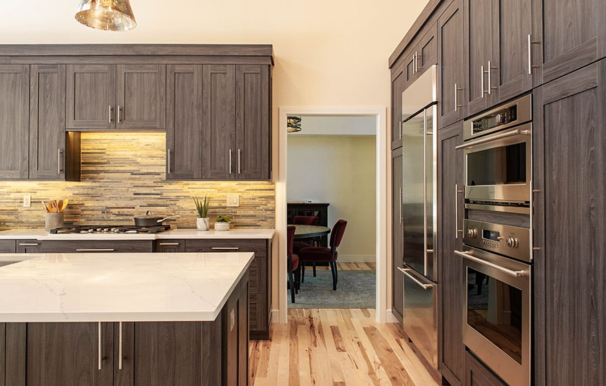 Stylish and sleek, this textured melamine kitchen provides a perfect place to gather and celebrate. 