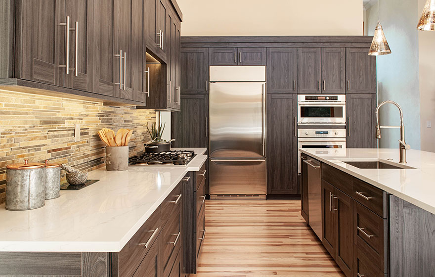 Stylish and sleek, this textured melamine kitchen provides a perfect place to gather and celebrate. 