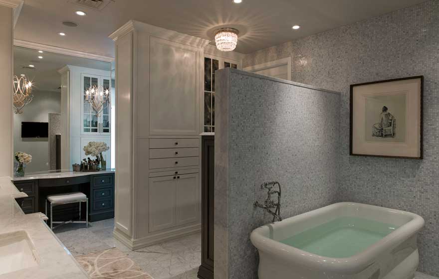 The clean and cool color palette of this beautiful bathroom brings a sense of relaxation and luxury.