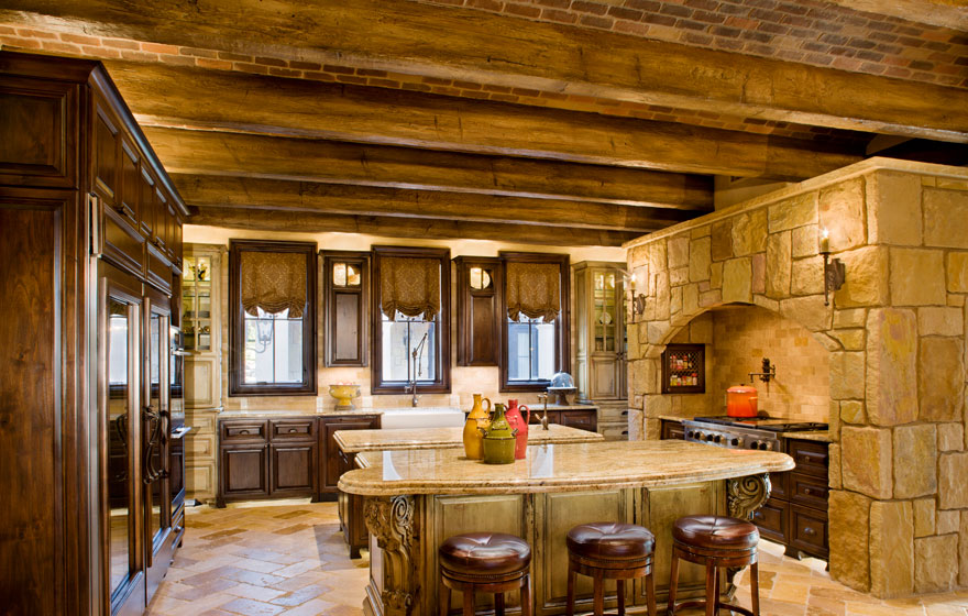 Dramatic ceilings and stonework provide a great backdrop to feature the Malibu 7/8" (50) Door style and some custom designed doors.