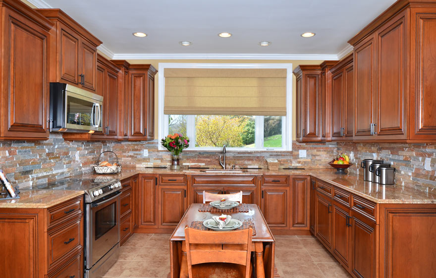 Timeless and classic, the beautiful cherry wood used in this Ridgeview kitchen is perfectly highlighted with glazing to add distinction and elegance.  