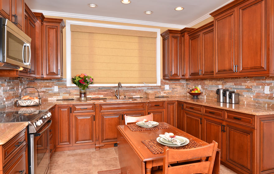 Timeless and classic, the beautiful cherry wood used in this Ridgeview kitchen is perfectly highlighted with glazing to add distinction and elegance.  