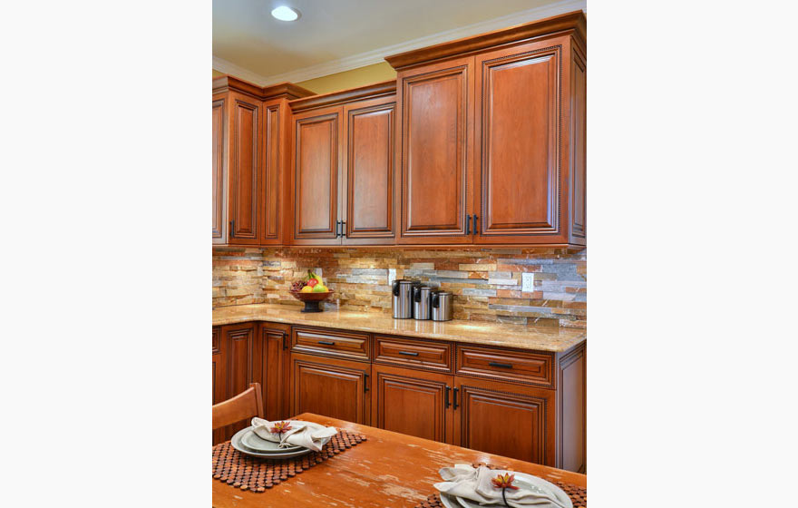 Timeless and classic, the beautiful cherry wood used in this Ridgeview kitchen is perfectly highlighted with glazing to add distinction and elegance.  