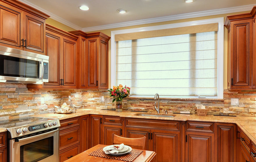 Timeless and classic, the beautiful cherry wood used in this Ridgeview kitchen is perfectly highlighted with glazing to add distinction and elegance.  