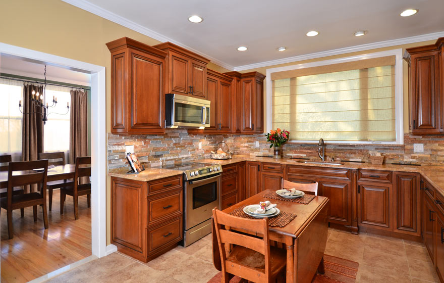 Timeless and classic, the beautiful cherry wood used in this Ridgeview kitchen is perfectly highlighted with glazing to add distinction and elegance.  