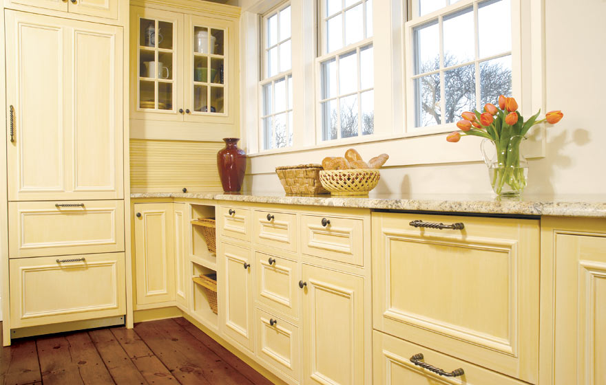 The subtle yellow paint and natural sunshine is light, airy, and inviting.