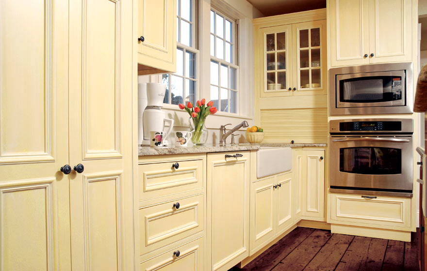 The subtle yellow paint and natural sunshine is light, airy, and inviting.