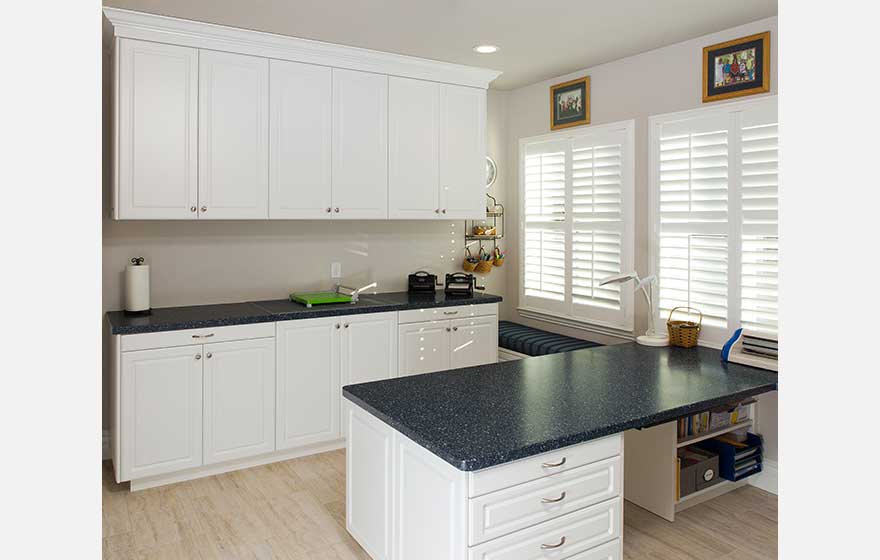 Create the craft space of your dreams with crisp white cabinetry and all your supplies perfectly organized.