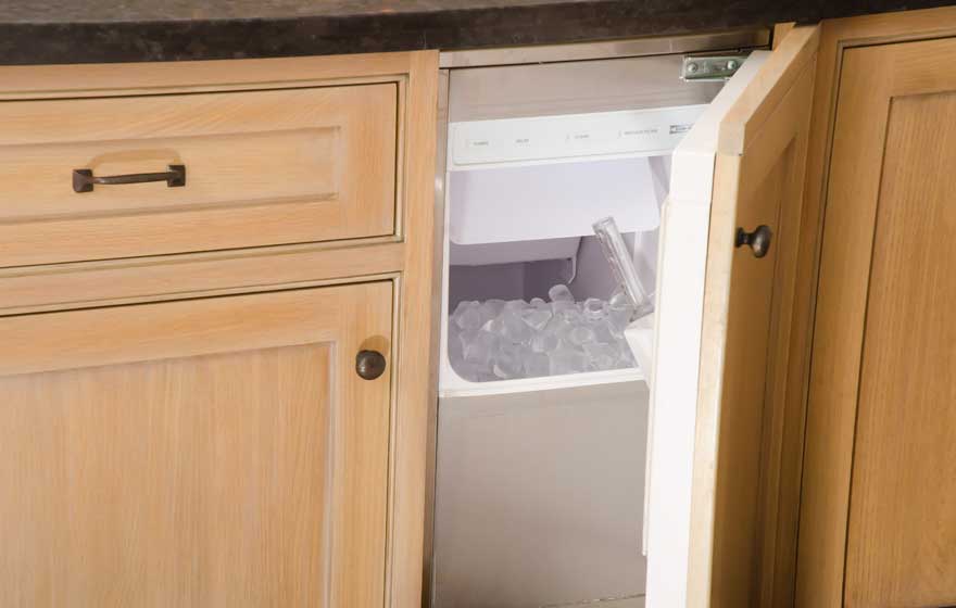 Rift Sawn White Oak pairs with painted cabinetry for a chic look in this large kitchen featuring dual islands.