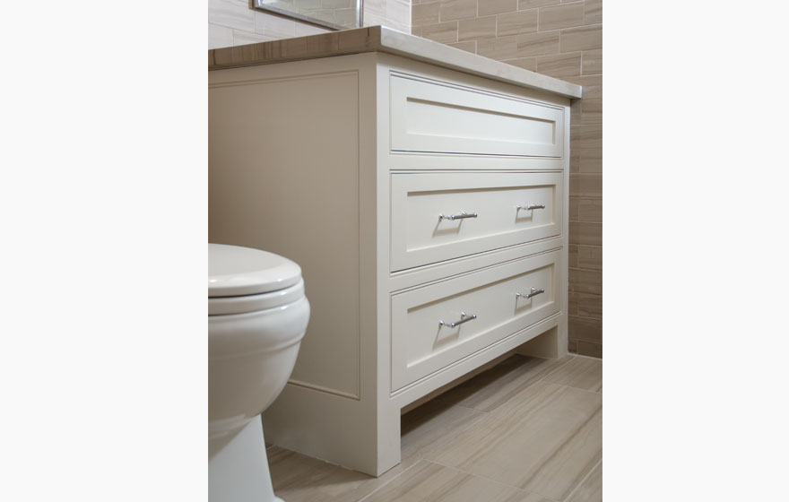 Crisp white paint and a simplistic, customized door create a clean look.