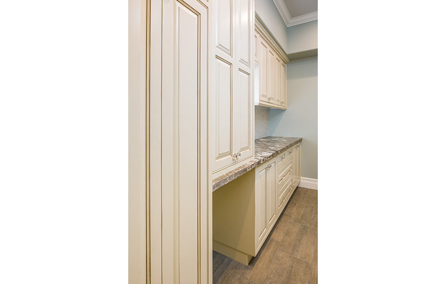 Classic beaded face frames, paired with the Heritage 3/4" (805), complement a beautiful laundry space.