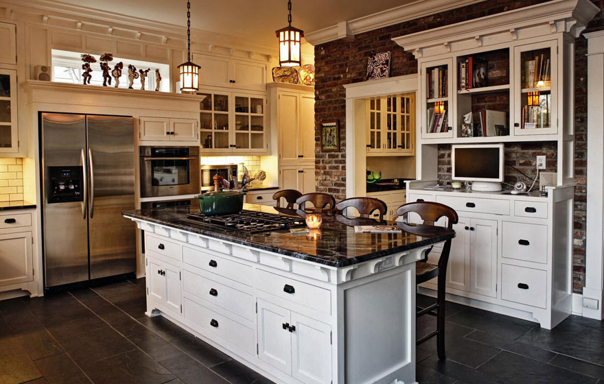This inviting space uses white painted cabinetry to keep the room open and airy so it can meet the demand of being the hub of family activity.