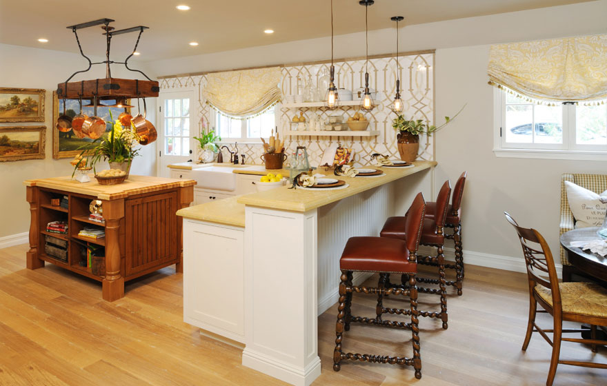 Perfectly designed from top to bottom, this kitchen uses two door styles, two Designer Face Frame edges, and two beautiful finishes to create a unique and inventive space.