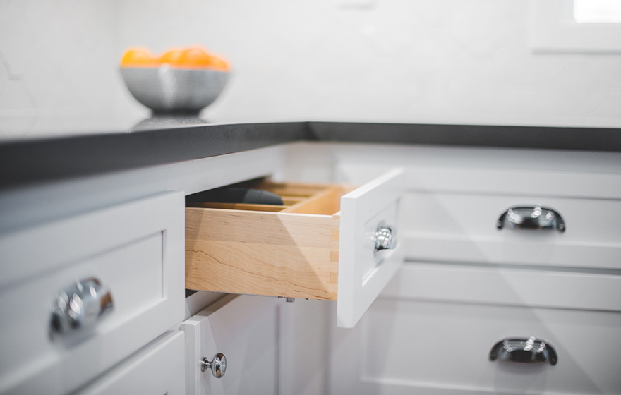 A dramatic pop of color on the island adds character to this Streamline® RTA Cabinet kitchen.