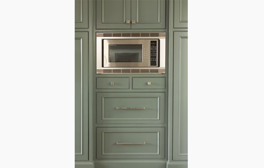 Laguna 3/4" (853) Doors are highlighted with rich, gorgeous sage blue paint. 