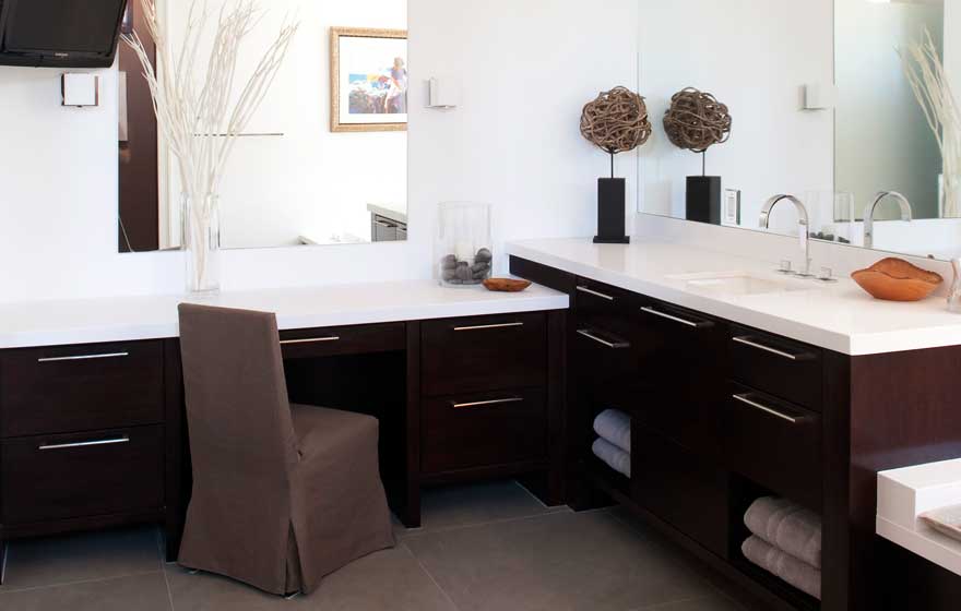 Using a simple door style and contrasting cabinets and countertops maintains a clean and sharp look.