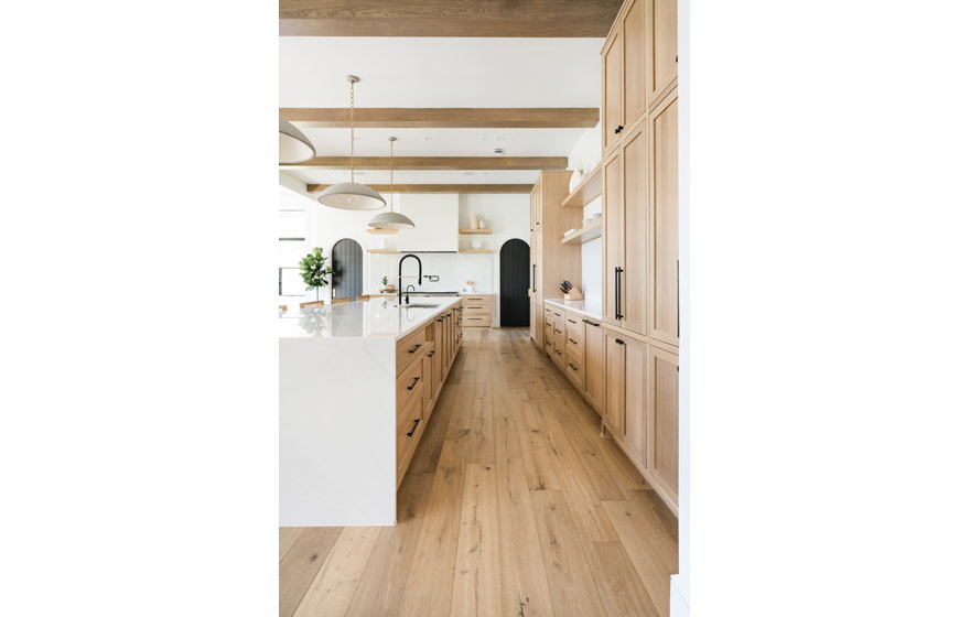 Warm and inviting Rift White Oak makes this kitchen jaw-dropping gorgeous